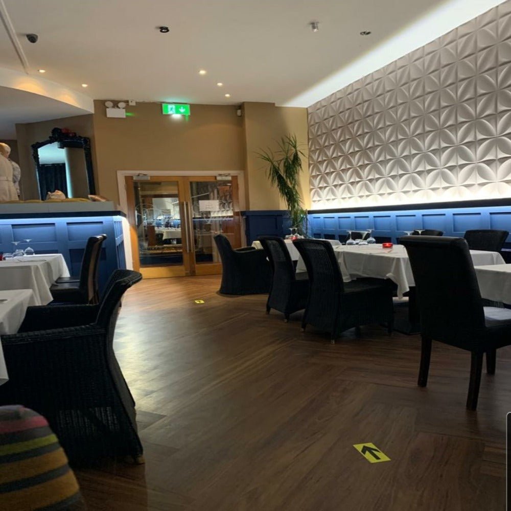 Interior view featuring Clover 3D PVC wall panels in a modern dining space