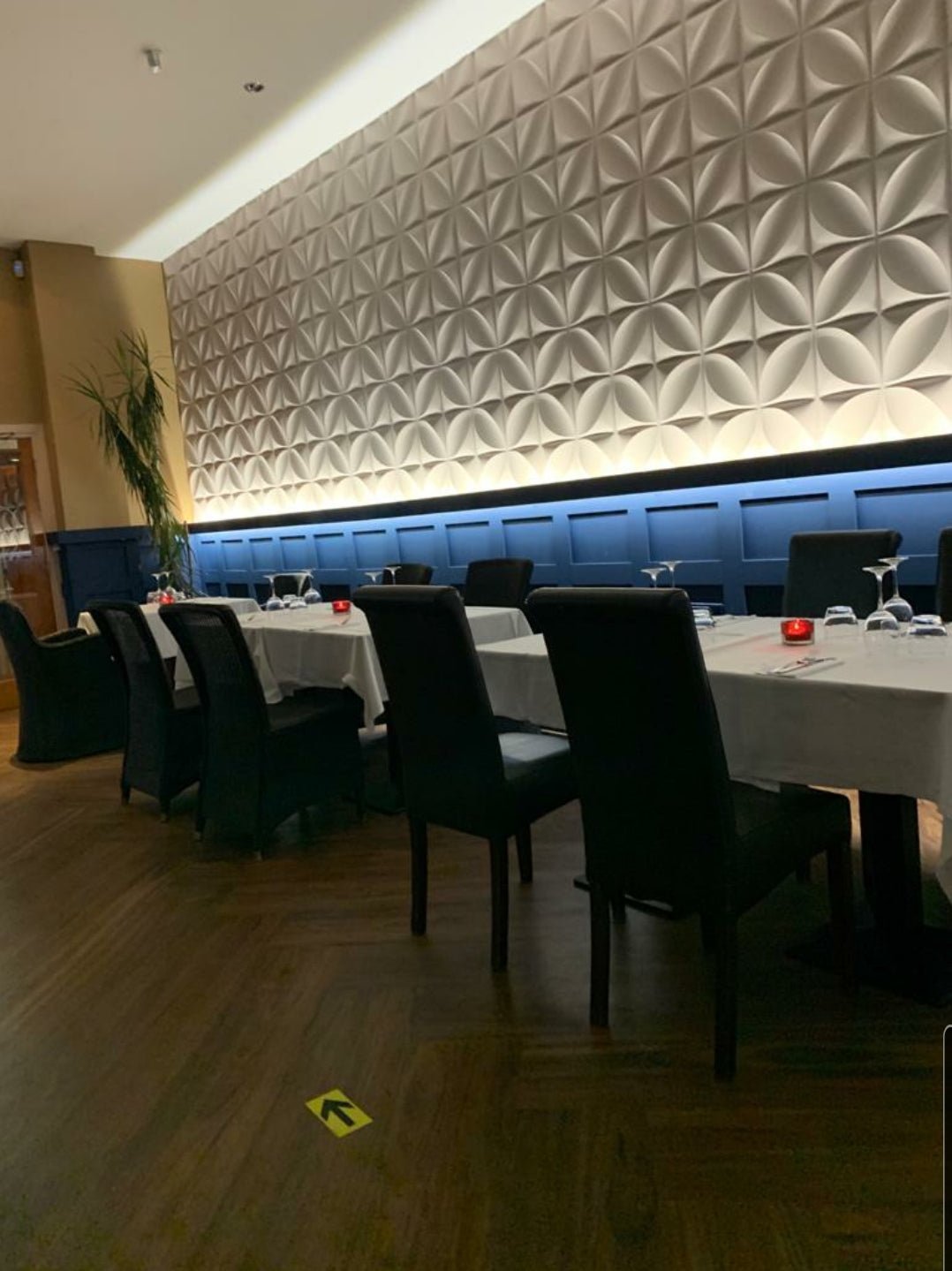 Contemporary restaurant interior decorated with Clover 3D PVC wall panel